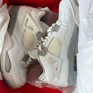 Jordan Air 4 Retro White and Black Sneakers